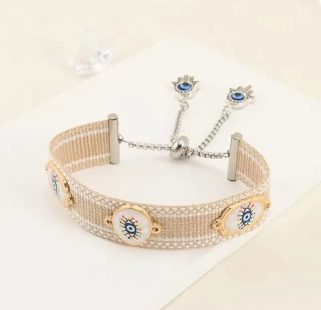 Cotton Handwoven Evil Eye bracelet with adjustable Stainless Steel Hamsa chain