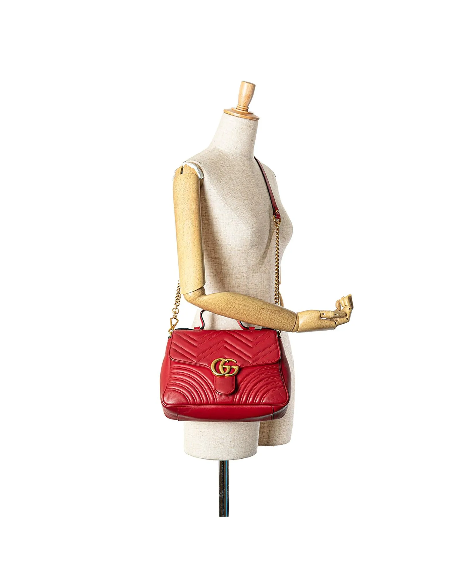 Small Leather Top Handle Satchel with Gold Tone Chain Strap and Quilted Design